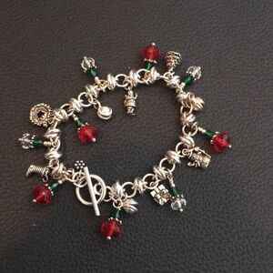 Christmas Charm Bracelet Earrings silver in color